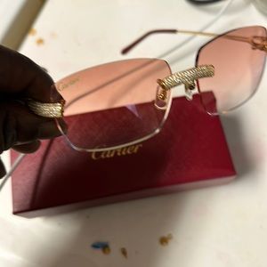 Gold bussdown OFFICIAL Cartier glasses w/red lenses. VS1 crushed diamonds